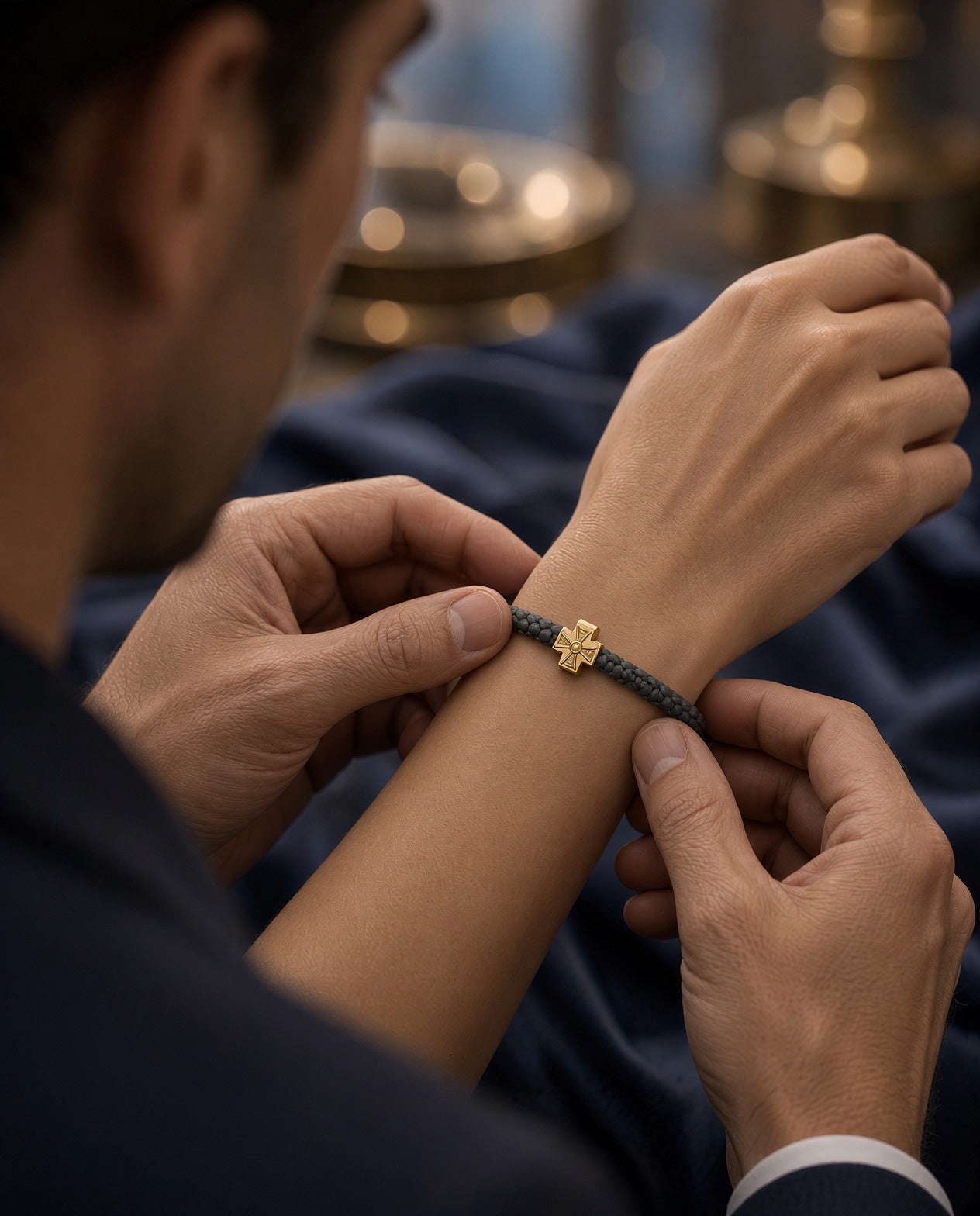 Hands placing Brojanica 33 — gift moment